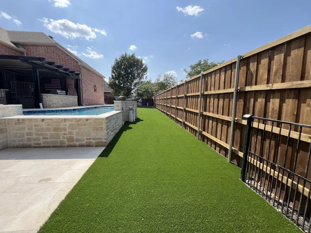 side yard green turf next to pool